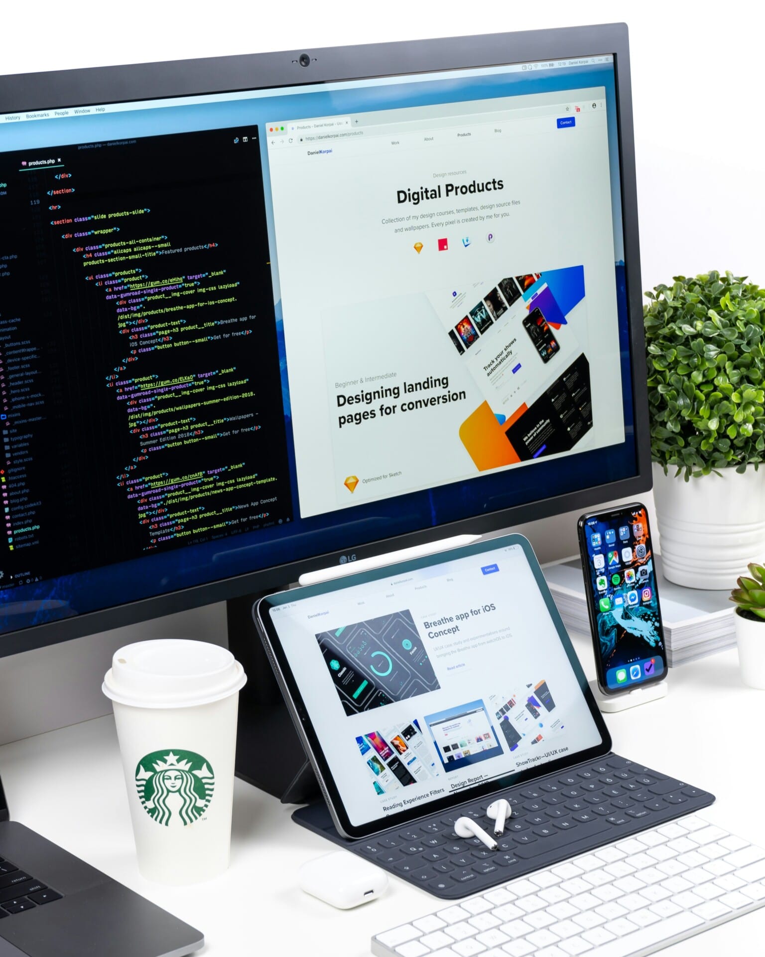 Workstation with code, websites, and devices displayed